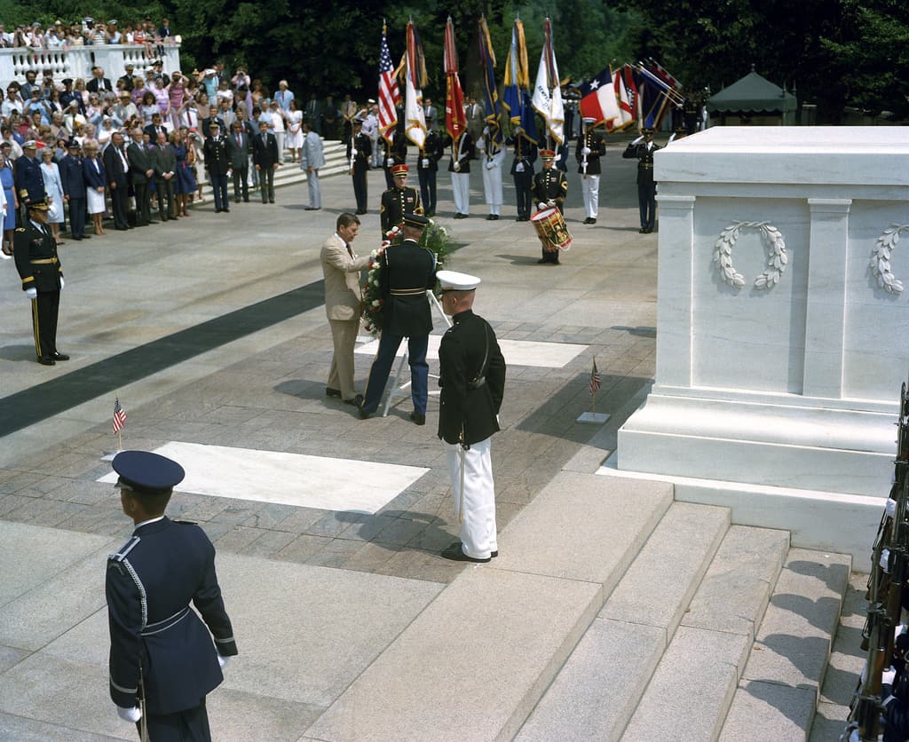 President Ronald Reagan places a wreath on the Tomb of the Unknown Soldier during a Memorial Day ceremony at Arlington National Cemetery.